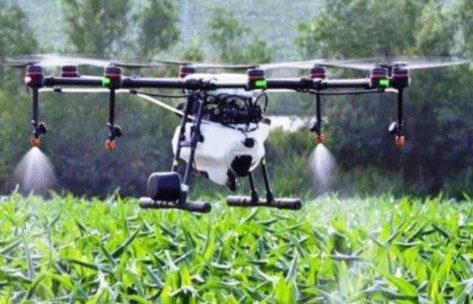 Sprinkler system watering a field.